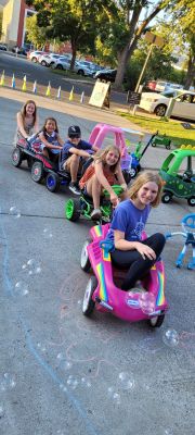 Group of Children Playing on Green Grass